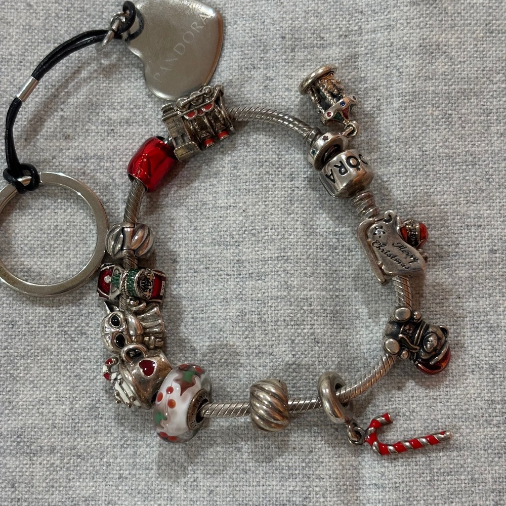 Pandora charm bracelet with 10 charms and 2 spacers